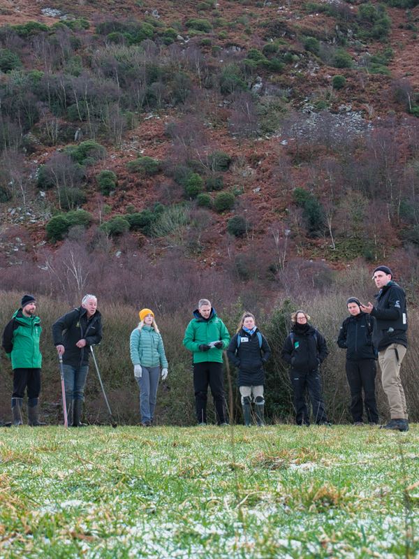 group talking in a field