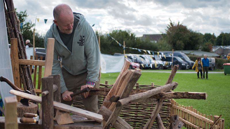 coopice coop member working with tools